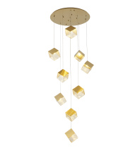 Bethel International GL446C27BR - 9-Light Brass Cubed Chandelier With A Clear Distorted Glass Shades